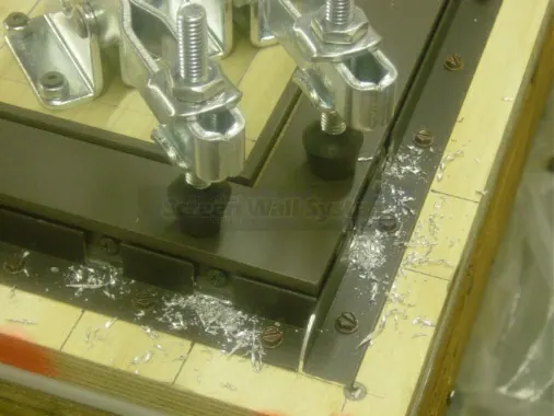 Step 9: Using a #26 drill bit, drill the remaining two holes and install assembly screws. Ensure all four assembly scr