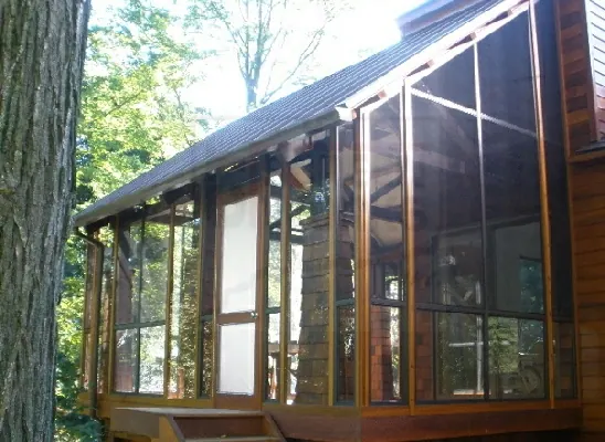 Interior view of a porch fitted with off-season glass inserts